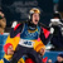 Olympijským vítězem na středním můstku je Němec Raimund, Koudelka byl 40.